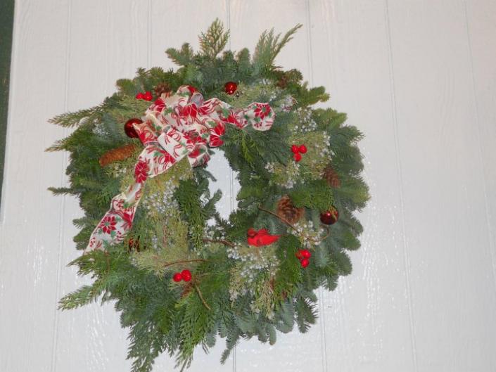 A Christmas wreath would look amazing on your front door. Welcome your guests with holiday cheer by adding a custom made wreath to your home decor. 